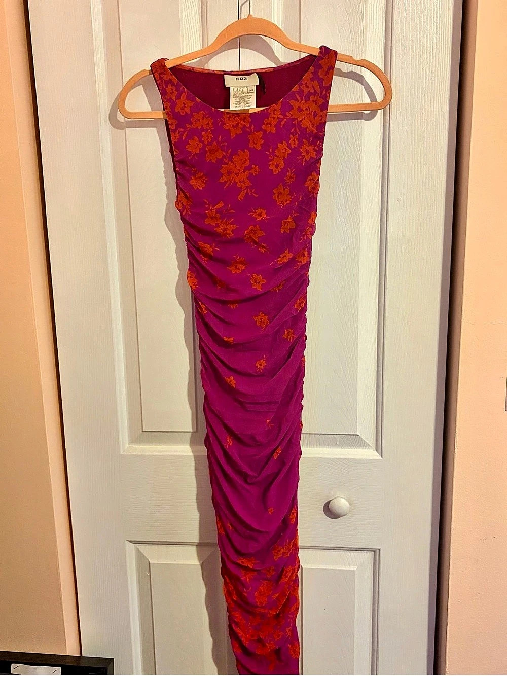 Steal the Scene in this stunning Fuzzi Floral Ruched Maxi Dress in dark Magenta